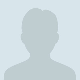 Grå silhuett av en person mot ljus bakgrund.